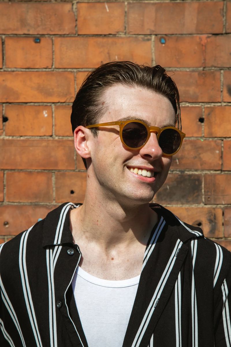 Classic side-parted slick back with tight sides